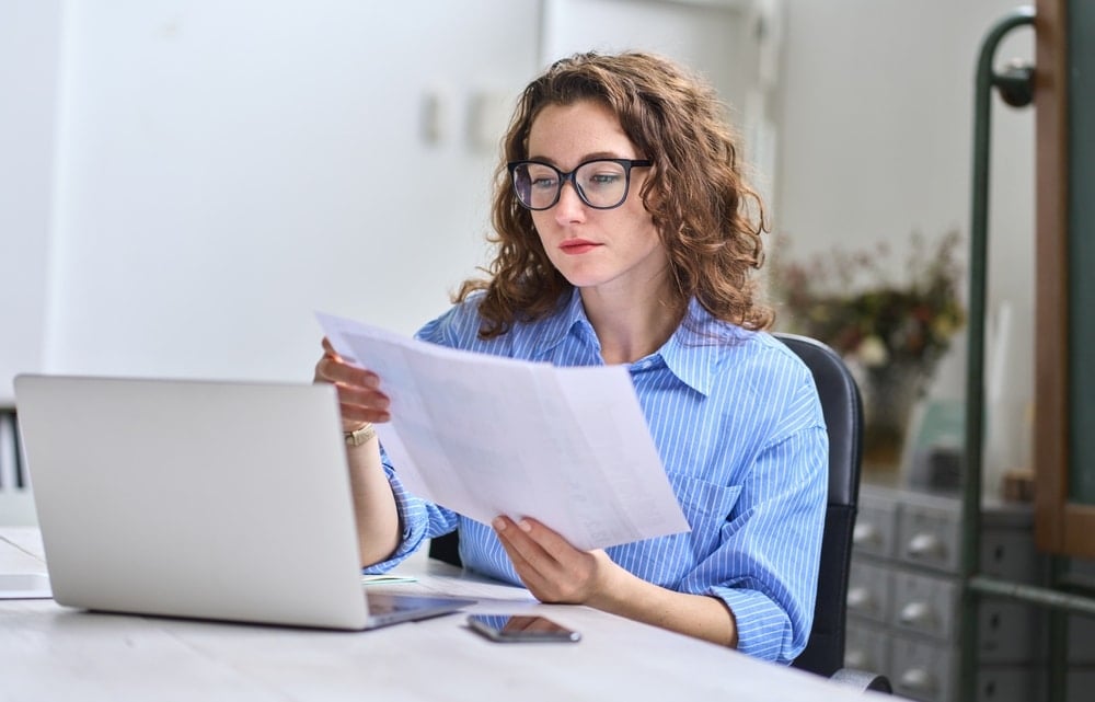 Young,Busy,Business,Woman,Manager,,Lawyer,Or,Company,Employee,Holding Paying utility bills