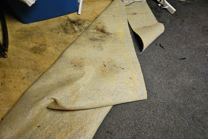 Old,Wet,And,Moldy,Carpet,Flooring,Being,Yanked,Up,From Carpet water damage