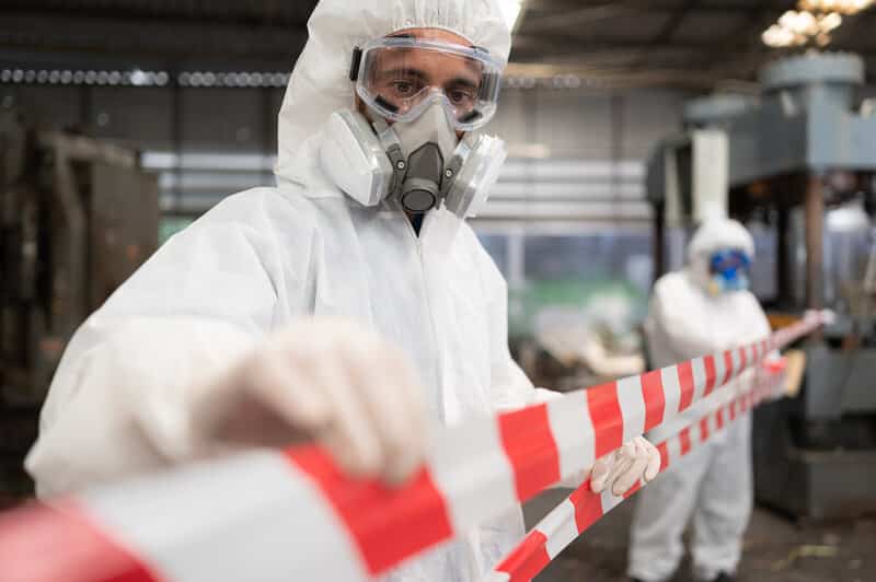 Restricted area, officials employ white and red stripes to block Asbestos containment