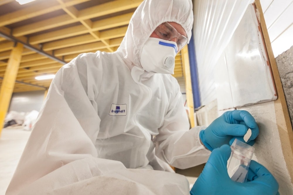 Asbestos,Surveyor,Taking,A,Sample,Of,Building,Material,,Detection,Of Asbestos surveyor inspecting material
